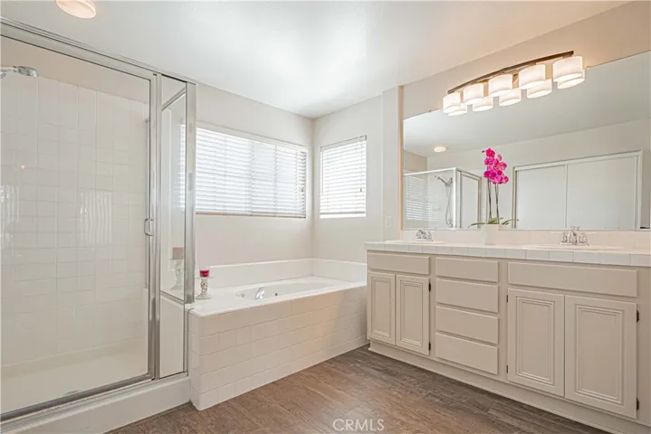 Primary shower enclosure has since been remodeled to frameless glass shower enclosure- see additional listing photos
