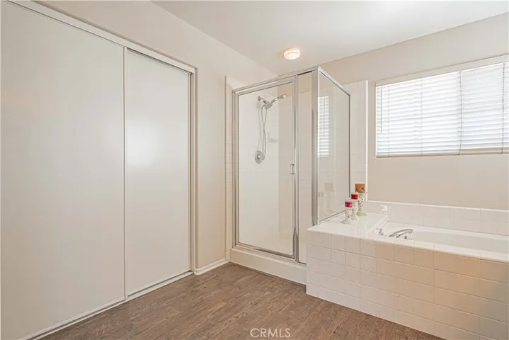Primary shower enclosure has since been remodeled to frameless glass shower enclosure- see additional listing photos
