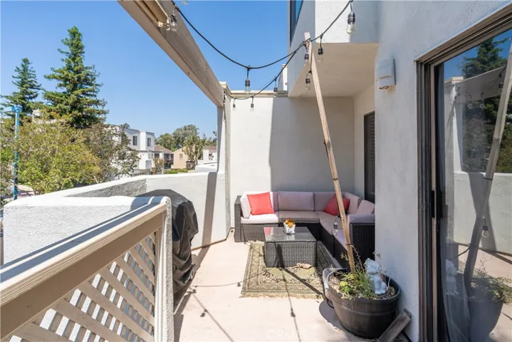 Balcony off family room and kitchen