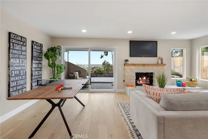 Family room with fireplace.
