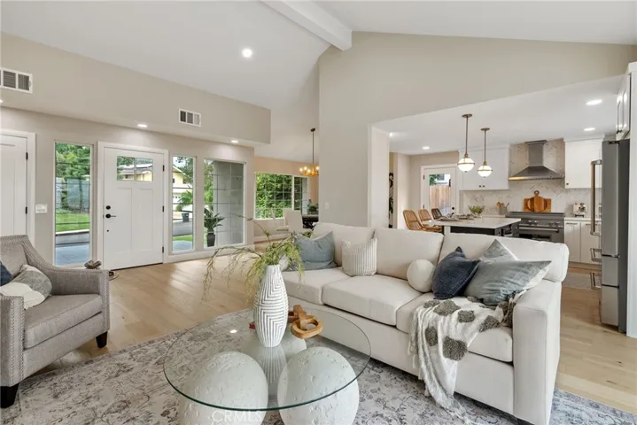 Formal living room toward the kitchen