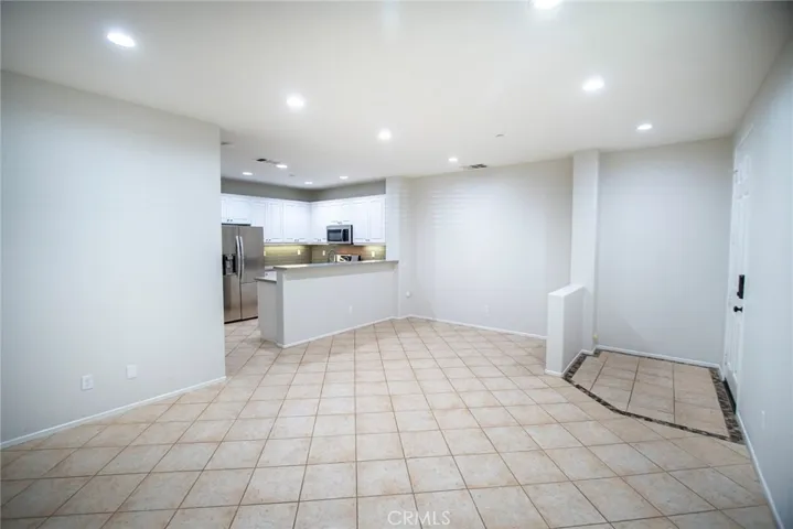 Large living room to kitchen