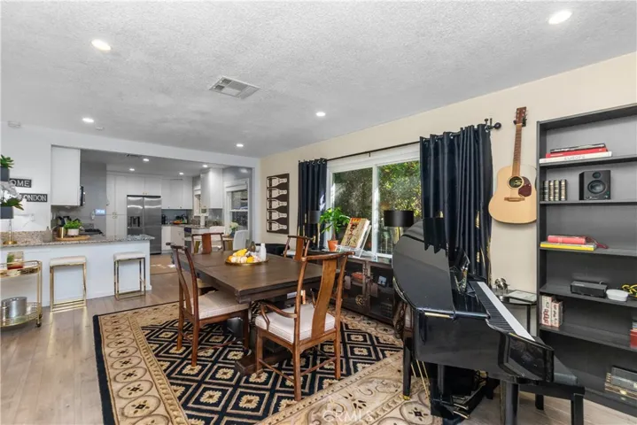 View of dining/kitchen upon entry