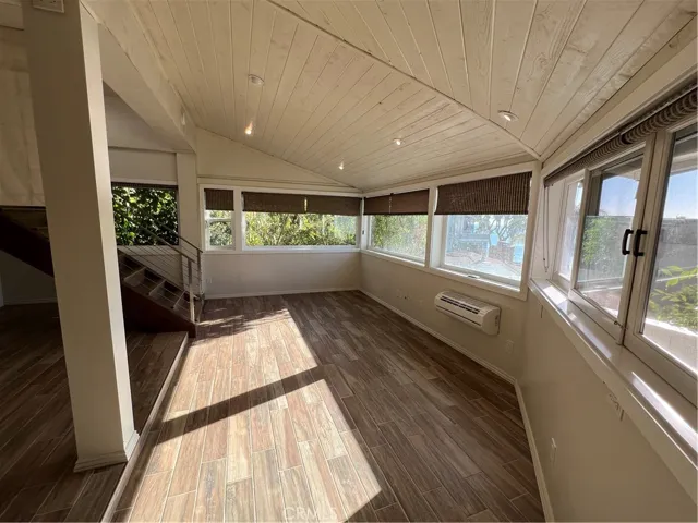 Spacious downstairs bedroom with a walk-in closet and private bathroom.