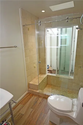 Main floor bedroom's full bath with two showers...an indoor and an outdoor shower.