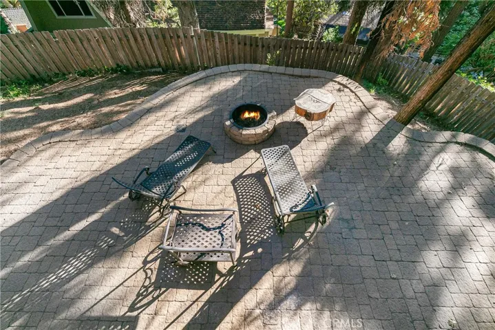 Fenced back yard with patio