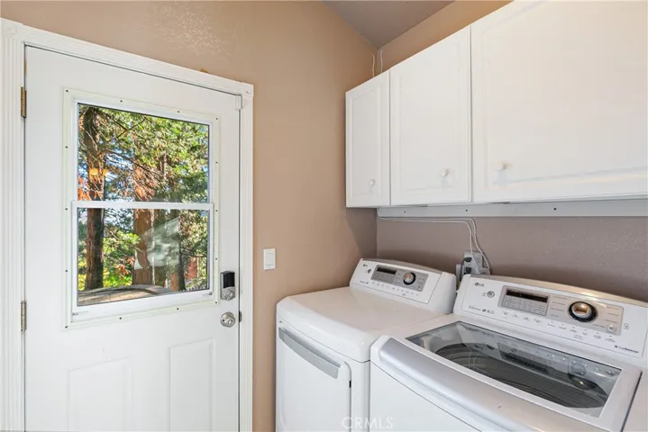 Laundry Room off Master Bath, leads to fenced yard