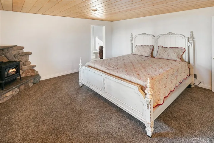 Master en-suite with fireplace stove
