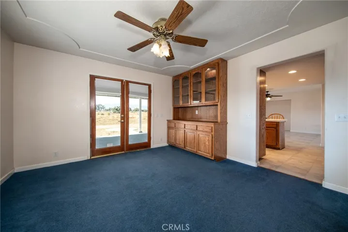 dining area in living room with builtins