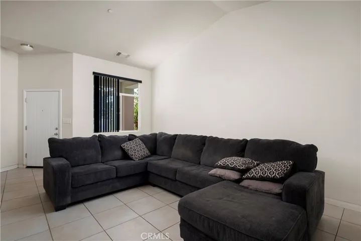 High ceilings at living & Dining area. Tile floors throughout.