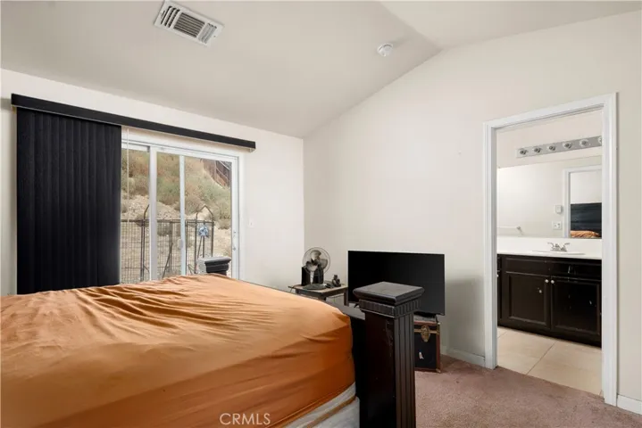 Master with high ceilings & 2 walk in closets & full master bath.