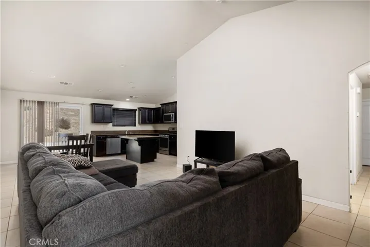 view of living, dining & kitchen areas.