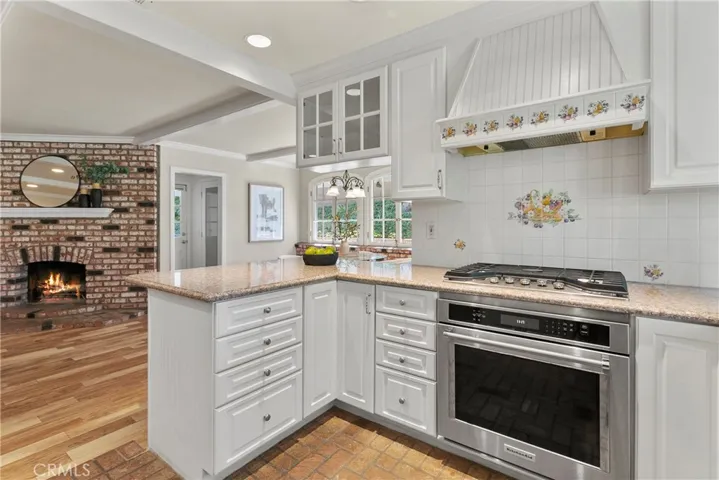 Stainless steel appliances and granite countertops.