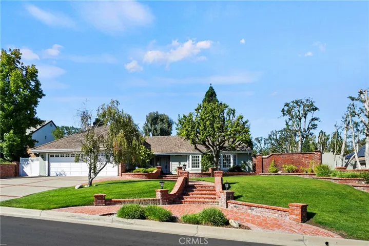 It's the total package with great curb appeal an amazing back yard and a beautiful interior!