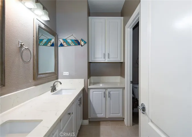 Second remodeled Bathroom with quartz counter tops.