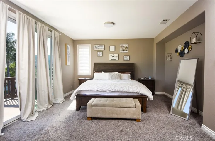 Master bedroom with balcony Mountain Views