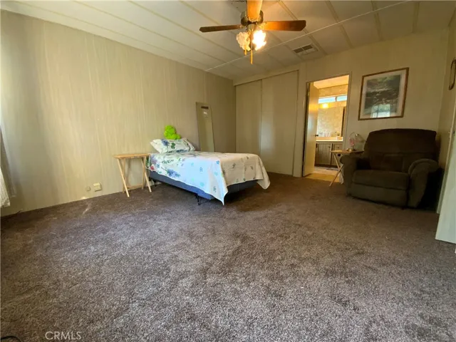 Spacious main bedroom has 2 separate closets and enough space for a seating area.