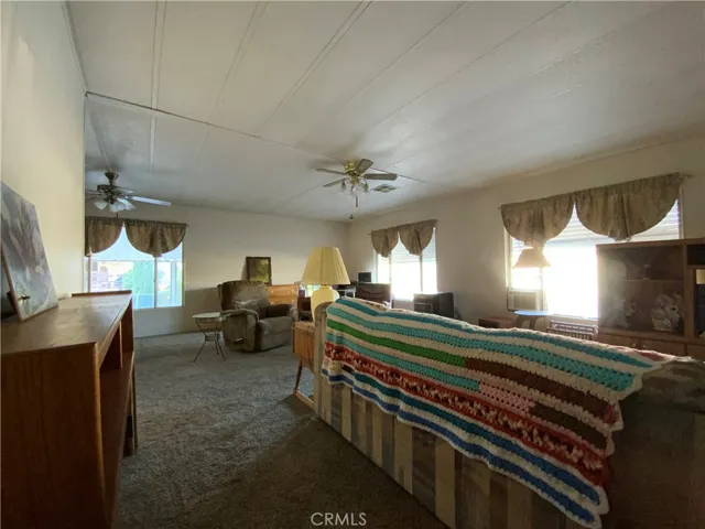 Spacious Living room with lots of windows that let in natural light.