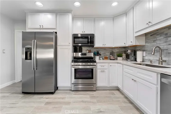 Newly updated kitchen with soft close cabinets/drawers. Appliances to remain.