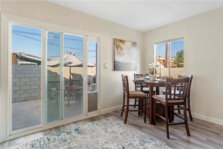 Dining area with sliders to concrete patio.
