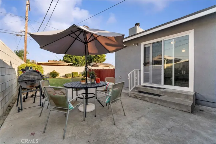 Room to dine al fresco. Sliders from family room.