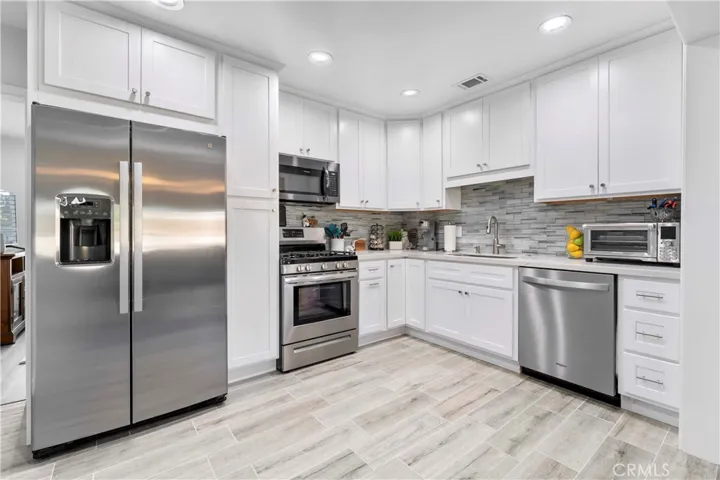 Newly updated kitchen with soft close cabinets/drawers. Appliances to remain.