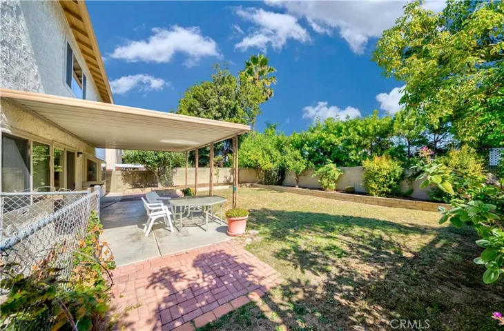 Private back yard. Fruit trees include apple, persimmon, lemon, tangerine and fig.