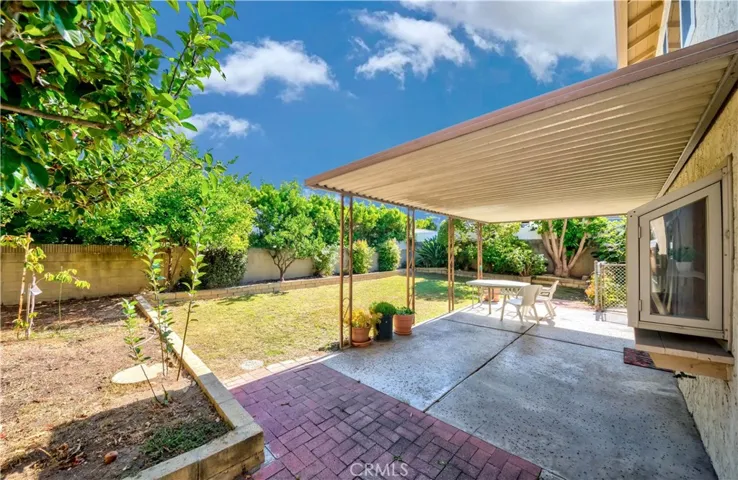 Covered patio in back yard