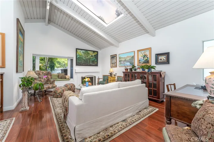 Living room is great room style open to the kitchen, dining room and den.