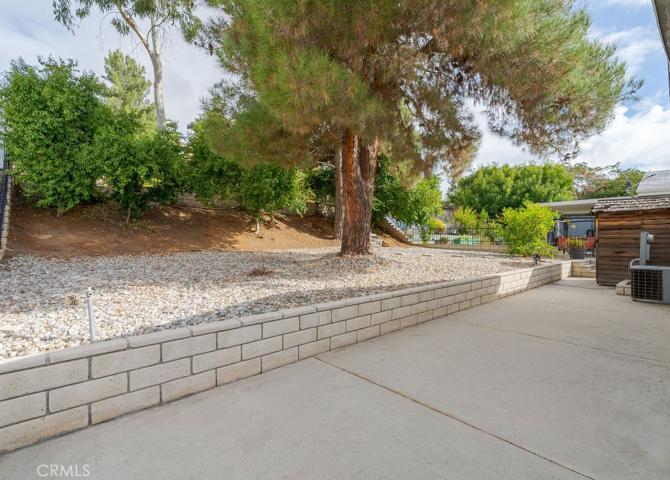 Storage shed included!