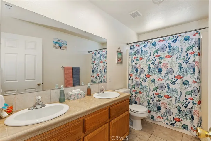11221 Omelveny Road, Oak Hills, California 92344