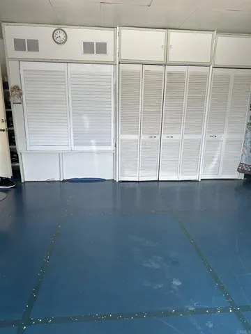 STORAGE AT BACKSIDE OF GARAGE