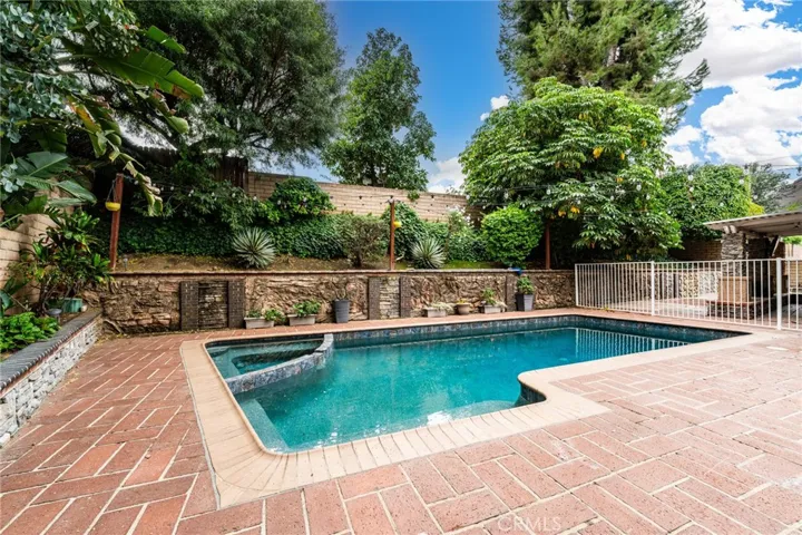 Gated Pool/Spa Area with Newer Pebble Tec