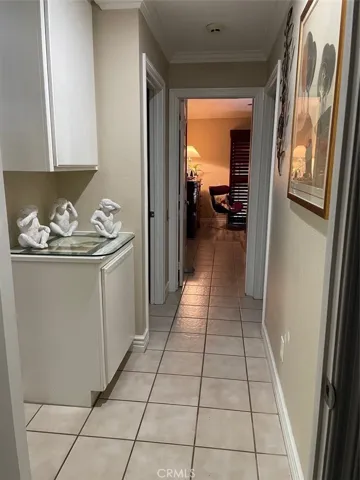 Hallway with linen storage plus closet