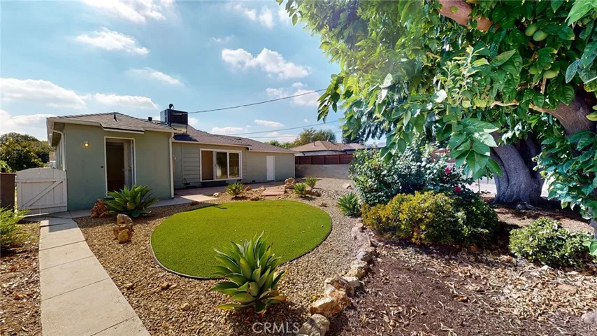 View of backyard facing back of house.
