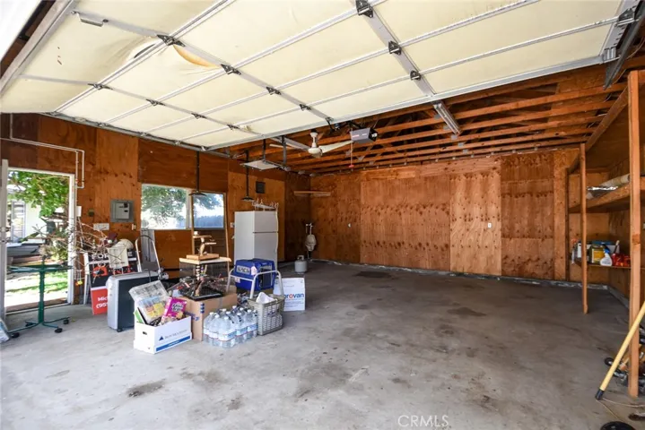 3+garage or man cave comes with refrigerator