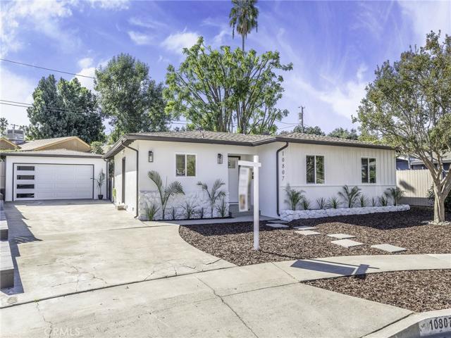 Front of Home with 2 car detached garage