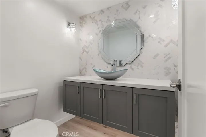 Downstairs bathroom, complete with under cabinet lighting.