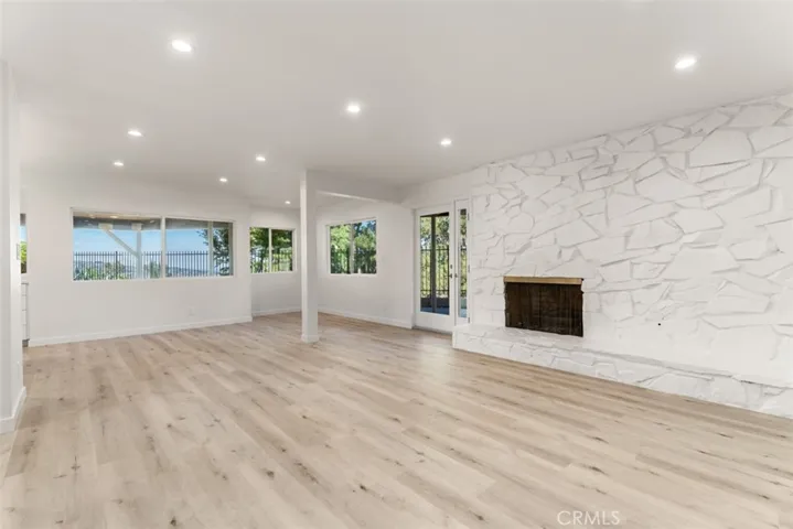 The family room is private and cannot be seen from the front door.