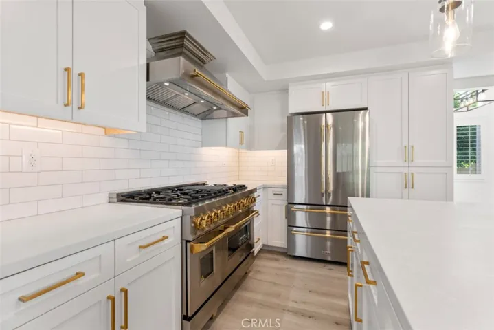 The newly remodeled kitchen is complete with all new appliances.