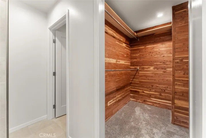 A large cedar lined walk-in closet.