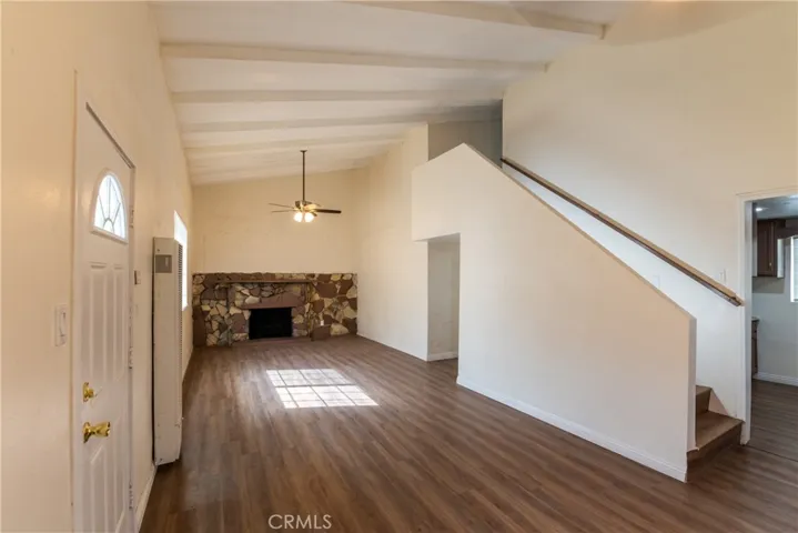 Living room entrance and fireplace