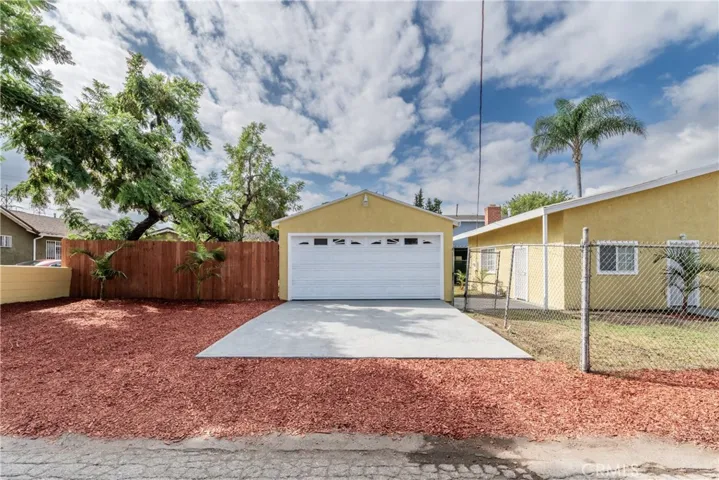 Detached two car garage and additional parking