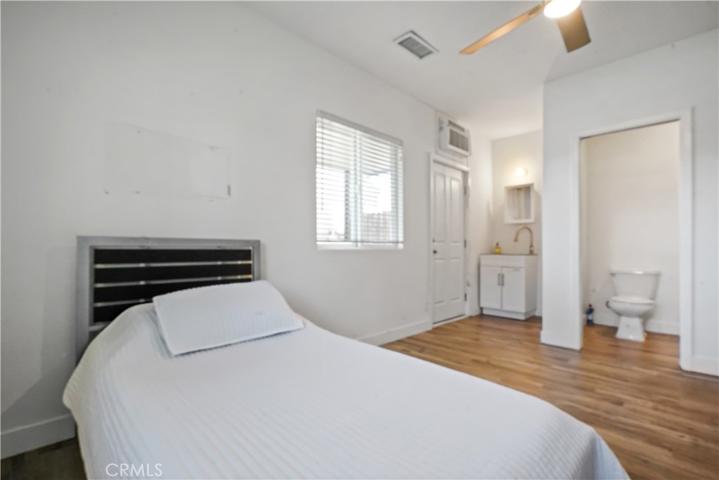 Bedroom 1 with it's private entrance & bathroom