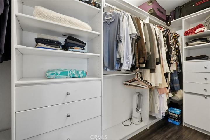 Main Suite- 1 of 2 closets w/custom shelves