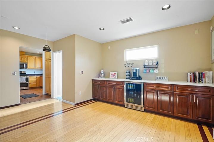 Family room with mini fridge & lots of cabinets