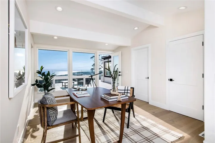 Features a bedroom that opens to a large ocean-view deck.