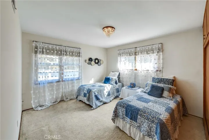 ORIGINAL HARDWOOD FLOORS UNDER CARPET . SECOND LARGE BEDROOM WITH LOTS  OF LIGHT AND CLOSET SPACE