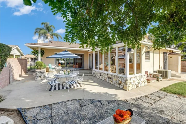 SPACIOUS CUSTOM PATIO WITH ANOTHER PAVER PATIO
