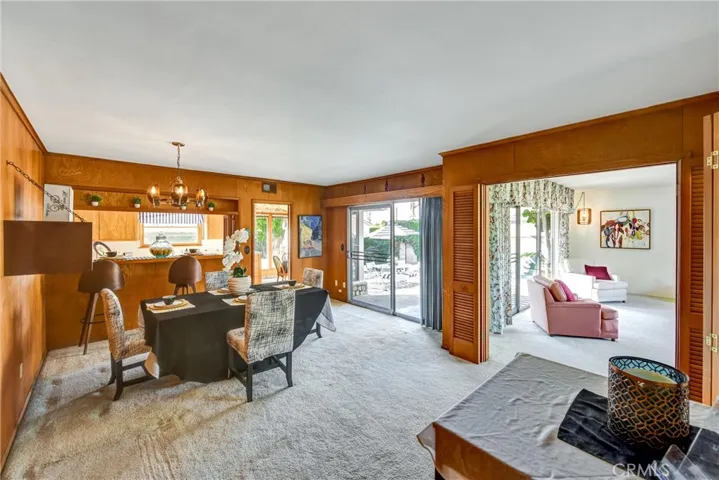 OPEN CONCEPT FAMILY ROOM WITH DINING  AREA TO KITCHEN AND LIVING ROOM